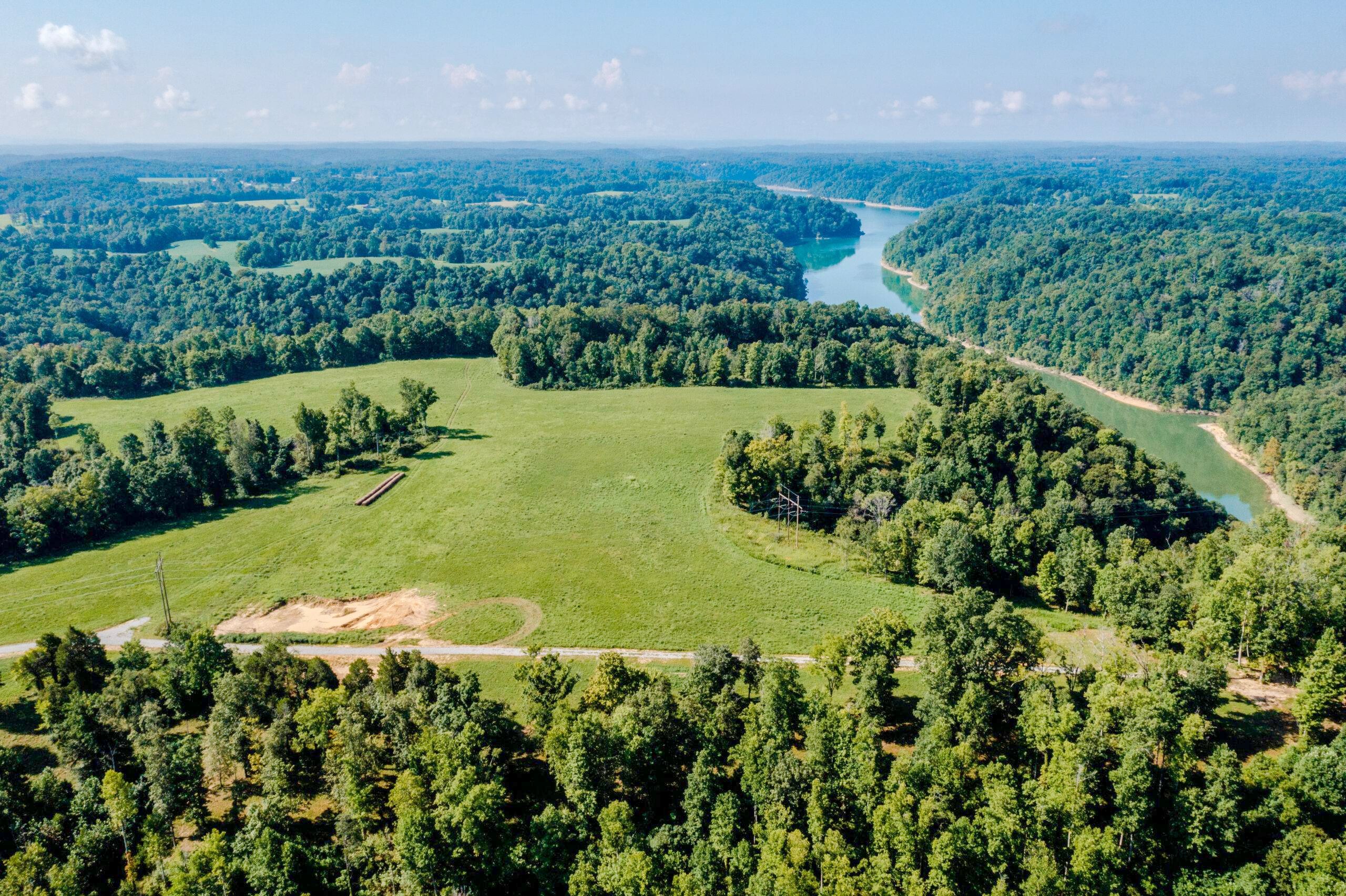 Aerial drone survey of the Kumberland property showing the pasture, forest, and Lake Cumberland watershed